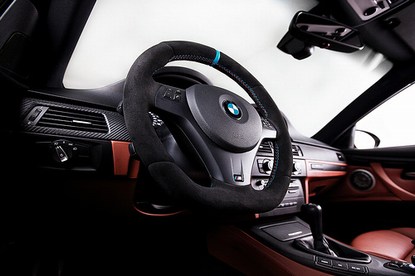 AutoTecknic Carbon Fiber Steering Wheel Trim - E90/ E92/ E93 3 Series/ E82 1 Series with Sport Package (Only fits steering wheels with Metallic Trim) main image 1
